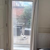 Photo 2: Large windows that allow access to garden + the house kitty🐈