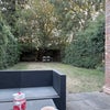 Photo 4: Large garden with plenty of seating in the front and the back 