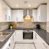 Photo 5: Kitchen with all goods microwave and airfryer