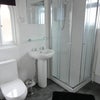 Photo 4: Bathroom with shower