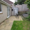 Photo 8: Rear garden with bike storage