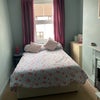 Photo 2: Bed in the middle of the room 
