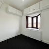 Photo 2: Dedicated office/lounge room