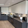 Photo 2: The kitchen set-up, with large amounts of counter space and storage