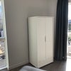 Photo 6: The bedroom comes with two bedside tables and a cabinet