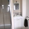 Photo 6: Shower and Sink