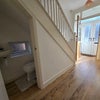 Photo 4: Downstairs toilet and hallway