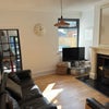Photo 8: Lounge with log burner
