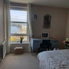 Photo 8: Bedroom with river views