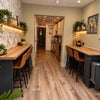 Photo 2: Comfy breakfast bars double up as workspace 