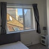 Photo 2: Bedroom — full bed, window and bedside table
