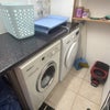 Photo 9: Laundry area with washing machine and dryer