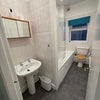 Photo 8: Bathroom inc. shower over bath and window ventilation
