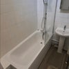 Photo 6: New Bathroom, inc new bath, shower, toilet, sink and floor