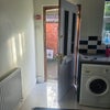 Photo 9: Separate ground floor rear entrance 
