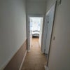 Photo 2: Hallway to Bedroom