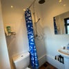 Photo 15: Spacious wet-room style.