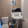 Photo 4: Upstairs bathroom with shower over bath (right)