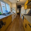 Photo 7: COMMUNAL KITCHEN
