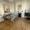 Photo 3: Large Living room - High ceilings with full height windows with oblique sea views