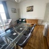 Photo 4: Large Living room - High ceilings with full height windows with oblique sea views