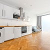 Photo 8: Kitchen/ living area 