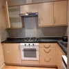 Photo 2: Kitchen shared with one person 