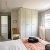Photo 2: West facing room with plenty of storage