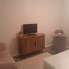 Photo 4: Cupboard  with TV provided if needed.