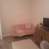 Photo 5: Small comfy sofa provided with rug. Some book shelves and wall light will be provided also.