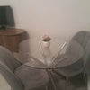 Photo 3: Glass dining table with 2 chairs provided