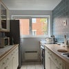 Photo 4: Kitchen (included: white goods, e.g., fridge/freezer, electric hob, oven, microwave oven, washer)
