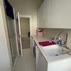 Photo 6: The downstairs bathroom/utility room with washer and dryer 🚿