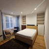Photo 5: Double bed, table and chairs