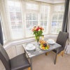 Photo 4: Bedroom with table and chairs