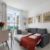 Photo 6: Living Room with double sofa bed