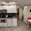 Photo 2: Kitchen and hallway area
