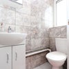 Photo 12: common bathroom