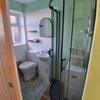 Photo 3: Electric shower and towel rail
