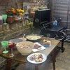 Photo 9: South facing back garden with a big BBQ