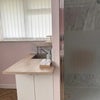 Photo 2: Shower and Kitchenette area