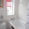 Photo 6: Communal bathroom - electric shower