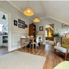 Photo 2: Hallway with dining table