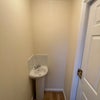 Photo 14: Downstairs Shared Toilet & Sink