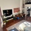 Photo 2: living room (note storage area)