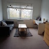 Photo 2: Seating and work area in room