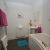 Photo 8: Bathroom shared between 2