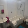 Photo 9: Bathroom shared between 2