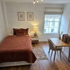 Photo 3: This Room 5 photo is enhanced by AI