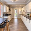 Photo 7: Communal kitchen/dining area